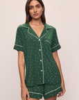 Model wears Gisele Printed TENCEL™ Modal Relaxed Short PJ Set in Winterpine Forest Green/Ivory.