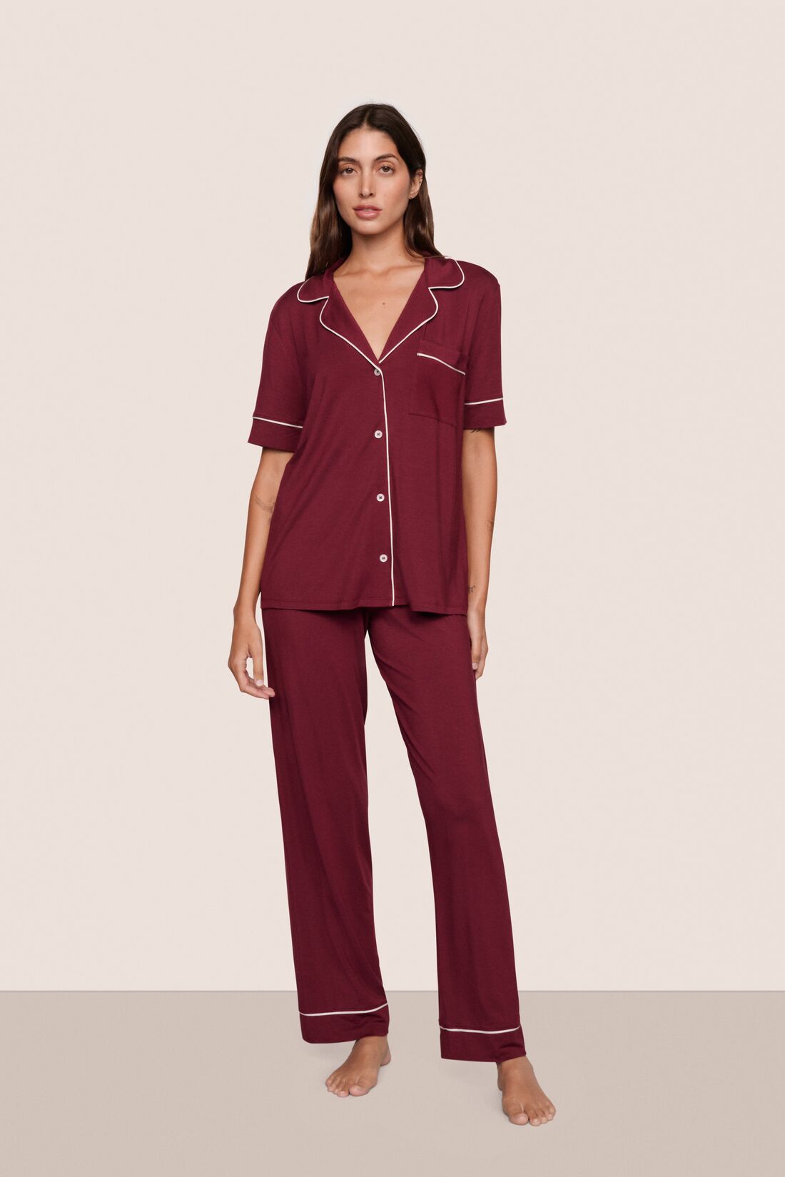 Model is wearing Gisele TENCEL™ Modal Short Sleeve & Pant PJ Set  in Bordeaux/Ivory