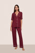 Model is wearing Gisele TENCEL™ Modal Short Sleeve & Pant PJ Set  in Bordeaux/Ivory