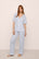 Model Is Wearing Gisele Short Sleeve PJ Pant Set In Ice Blue/Ivory