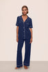 Model is wearing Gisele TENCEL™ Modal Short Sleeve & Pant PJ Set in Navy/Ivory