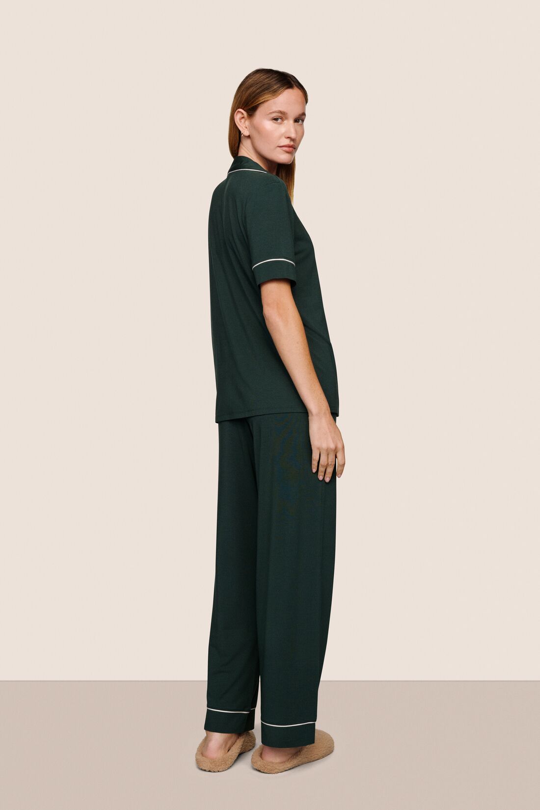 Model is wearing Gisele TENCEL™ Modal Short Sleeve & Pant PJ Set  in Pine/Ivory