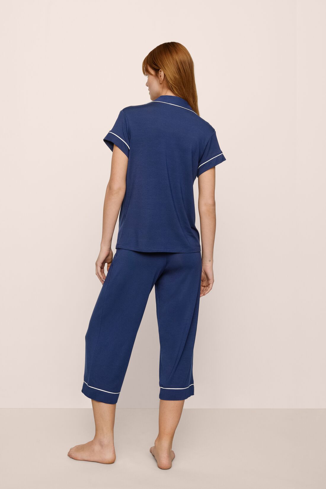 Model Is Wearing Gisele Short Sleeve Crop PJ Set In Navy/Ivory