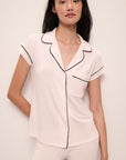 Model wears Gisele TENCEL™ Modal Short Sleeve Cropped PJ Set in sorbet pink/navy.