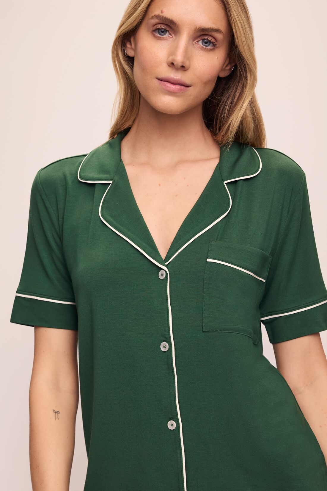 Model wears Gisele TENCEL™ Modal Short Sleeve & Pant PJ Set in Forest Green/Ivory.