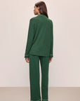 Model wears the Gisele TENCEL™ Modal Long PJ Set in Forest Green/Ivory.