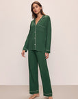 Model wears the Gisele TENCEL™ Modal Long PJ Set in Forest Green/Ivory.