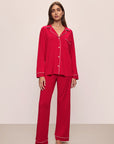 Model wears the Gisele TENCEL™ Modal Long PJ Set in Haute Red/Ivory.