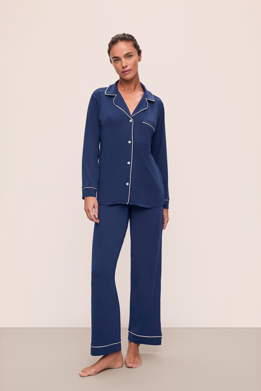 Model wears Gisele TENCEL™ Modal Long PJ Set in Navy/Ivory