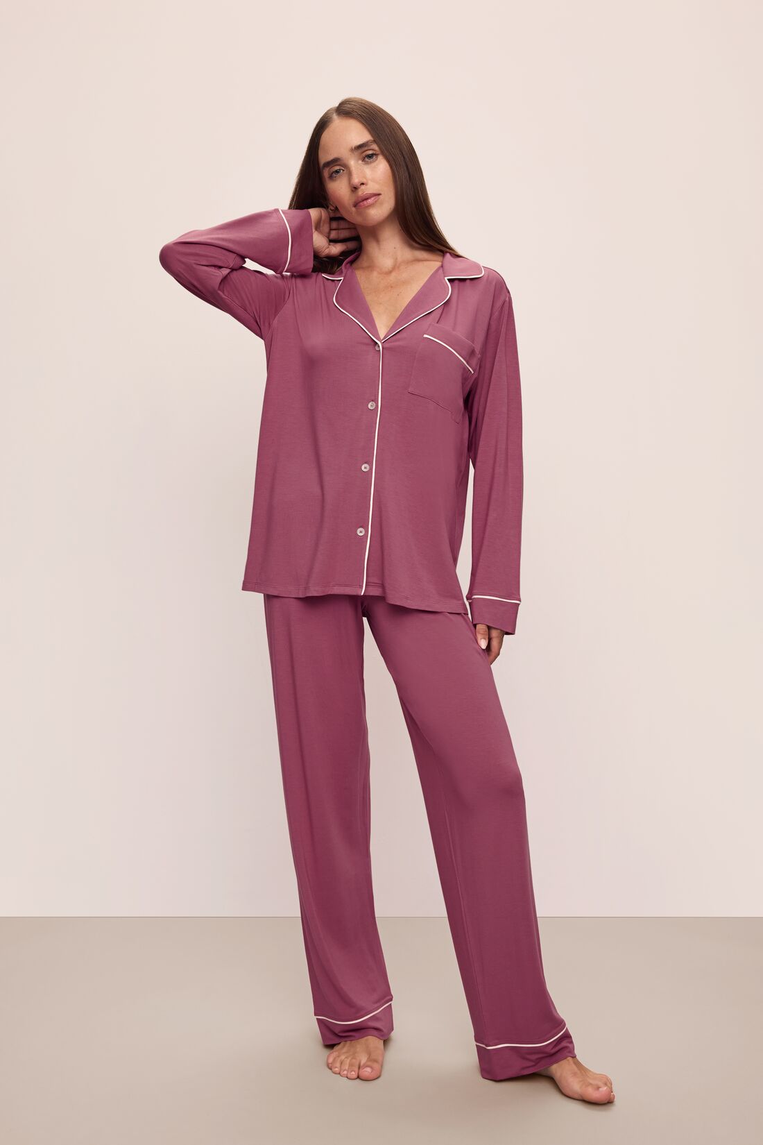 Model wears Gisele TENCEL™ Modal Long PJ Set in Raspberry/Ivory.