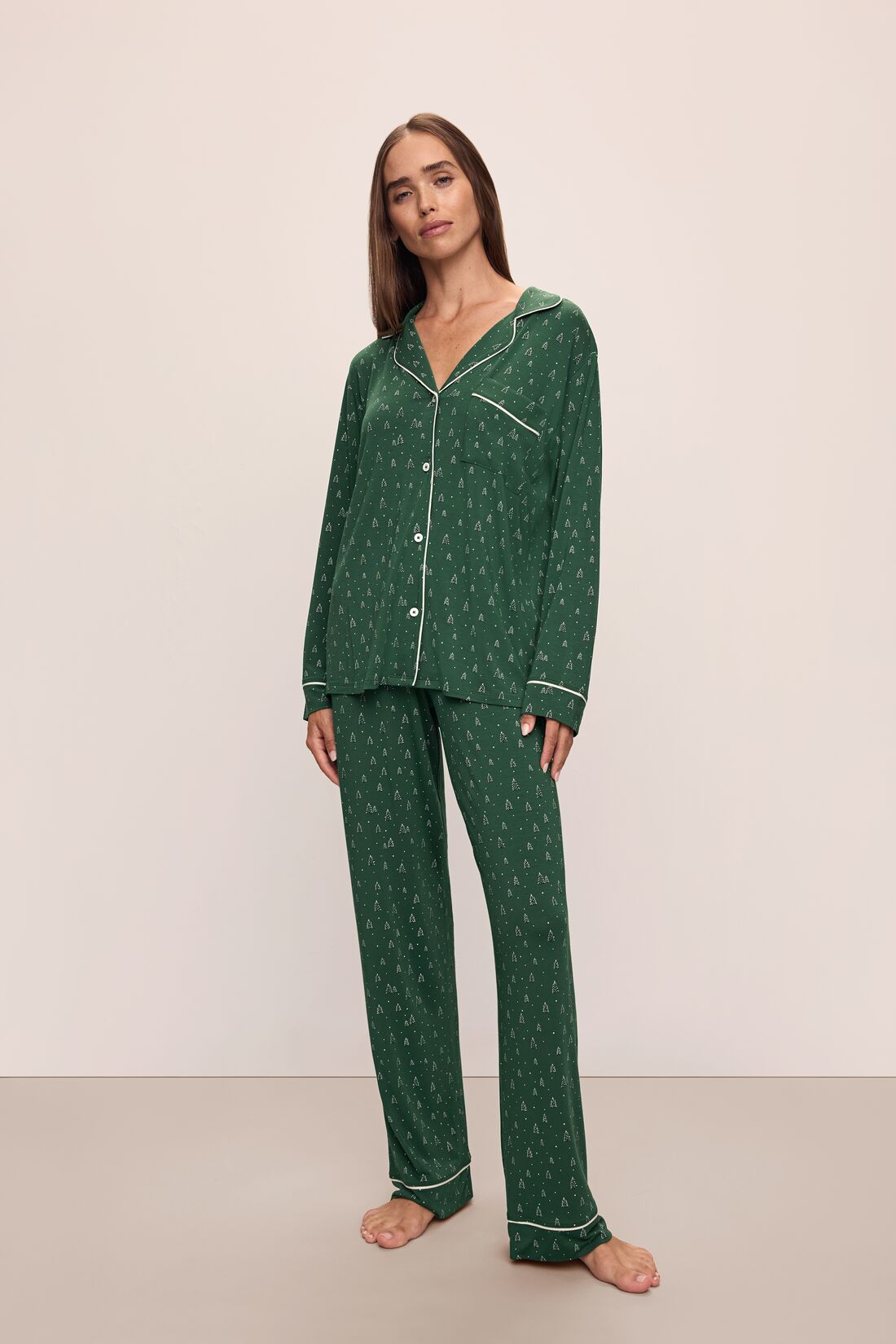 Model wears the Gisele Printed TENCEL™ Modal Long PJ Set in Winterpine Forest Green/Ivory.