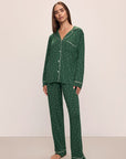 Model wears the Gisele Printed TENCEL™ Modal Long PJ Set in Winterpine Forest Green/Ivory.