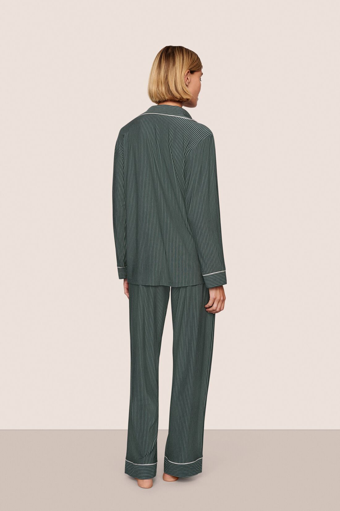 Model is wearing Gisele Printed TENCEL™ Modal Long PJ Set  in Duo Stripe Pine/Ivory
