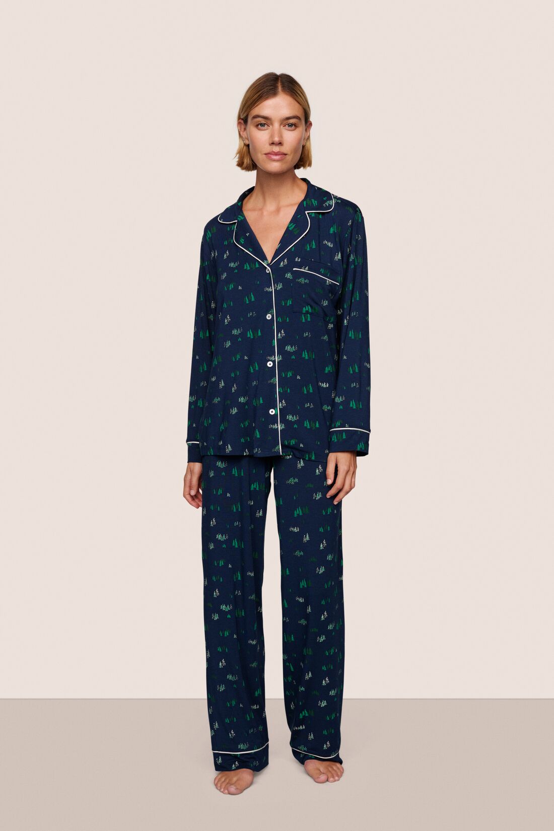 Model is wearing Gisele Printed TENCEL™ Modal Long PJ Set  in Forest Pine Navy/Ivory