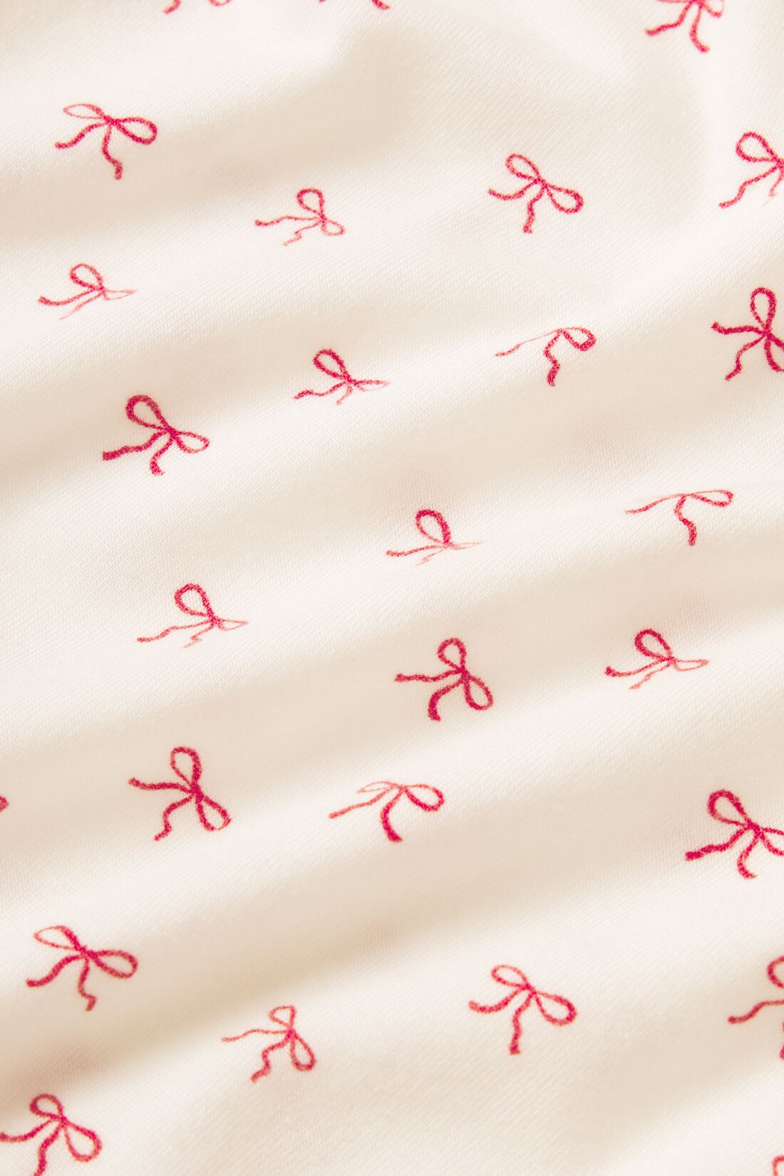 Gisele Printed TENCEL™ Modal fabric in Mini Bow Ivory/Holly Red