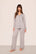Model is wearing Gisele Printed TENCEL™ Modal Long PJ Set in Geo Sphere Gray Dawn