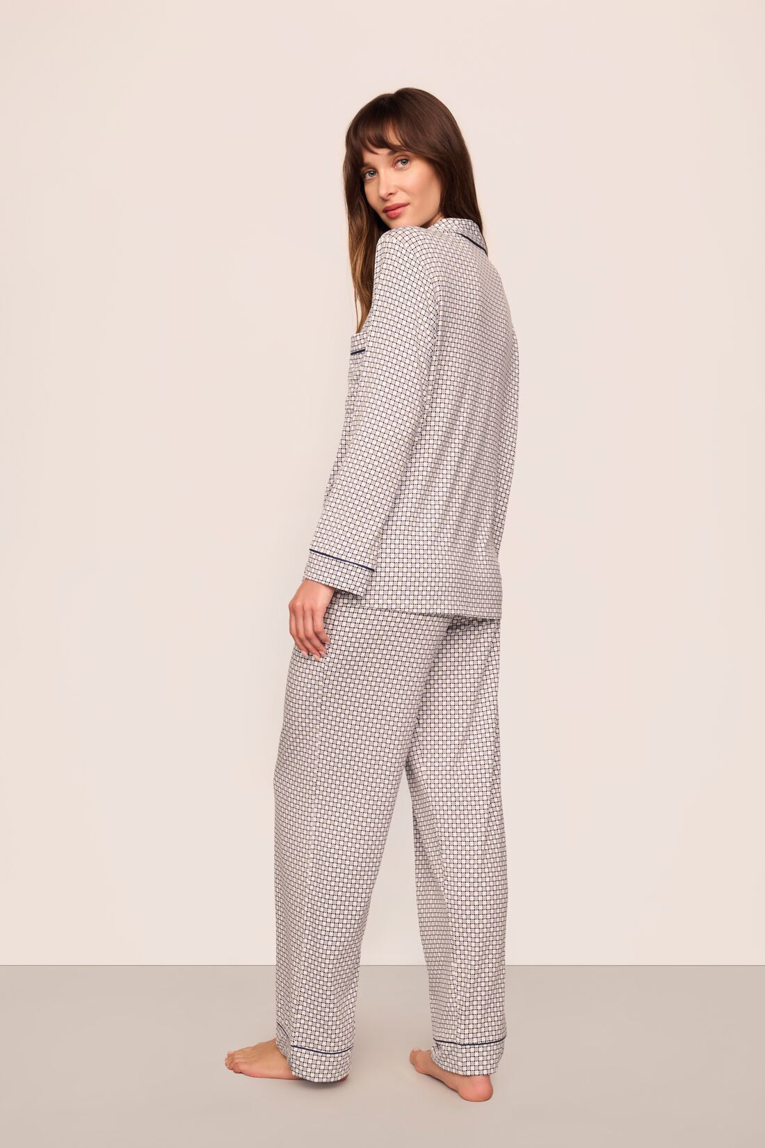 Model is wearing Gisele Printed TENCEL™ Modal Long PJ Set in Geo Sphere Gray Dawn