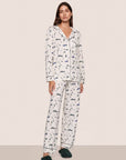 Model is wearing Gisele Printed TENCEL™ Modal Long PJ Set  in Ski Chalet Ivory/Pine