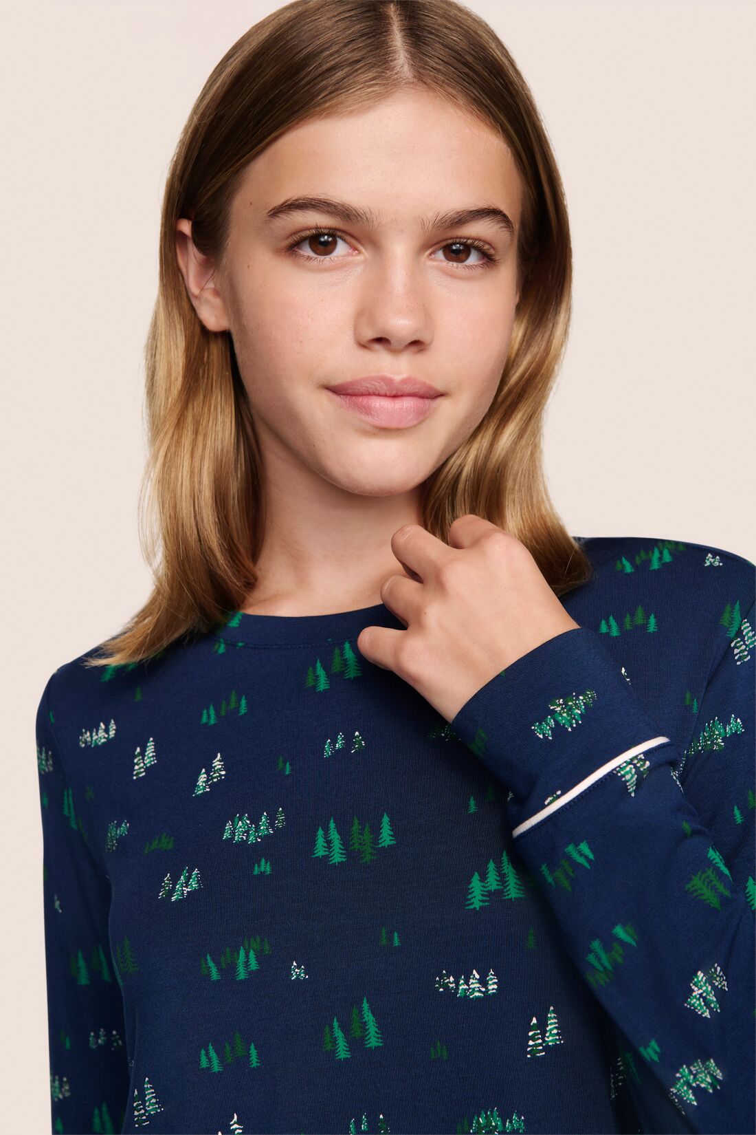 Model is wearing Gisele Printed TENCEL™ Modal Crewneck PJ Set in Forest Pine Navy/Ivory