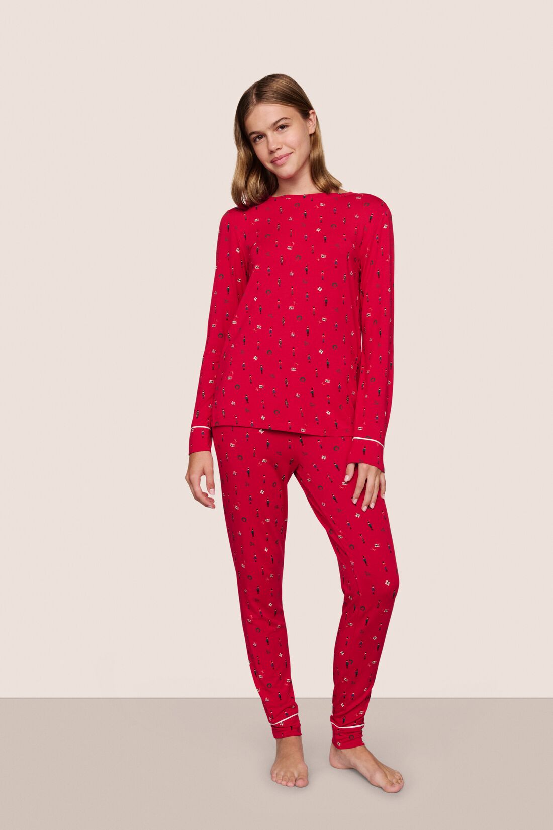 Model is wearing Gisele TENCEL™ Crewneck PJ Set in Nutcracker Holly Red/Ivory