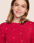 Model is wearing Gisele TENCEL™ Modal Crewneck PJ Set in Nutcracker Holly Red/Ivory