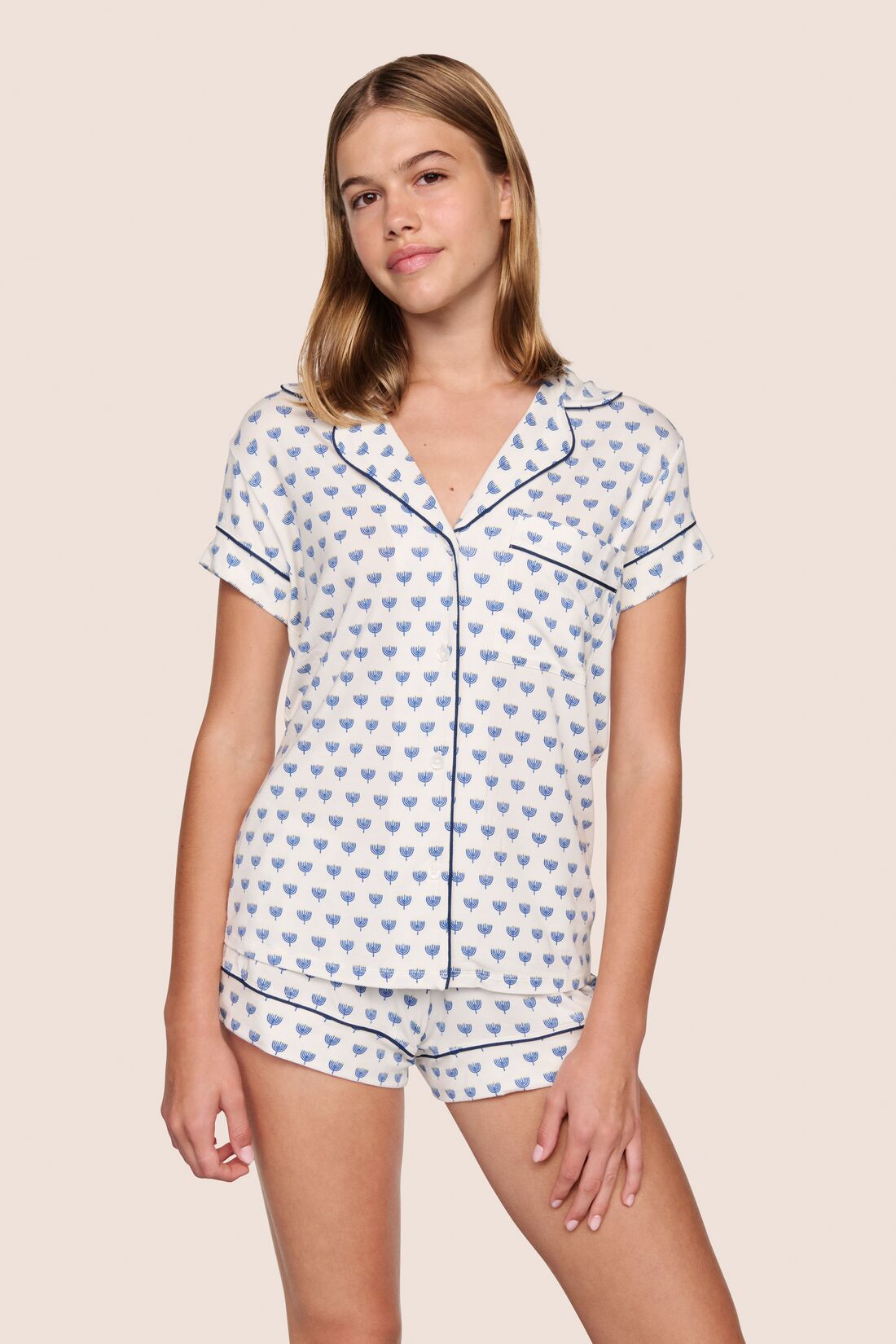 Model is wearing Gisele Printed TENCEL™ Modal Shortie Short PJ Set  in Hanukkah Glow Nouvean Navy/Navy