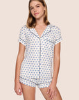 Model is wearing Gisele Printed TENCEL™ Modal Shortie Short PJ Set  in Hanukkah Glow Nouvean Navy/Navy