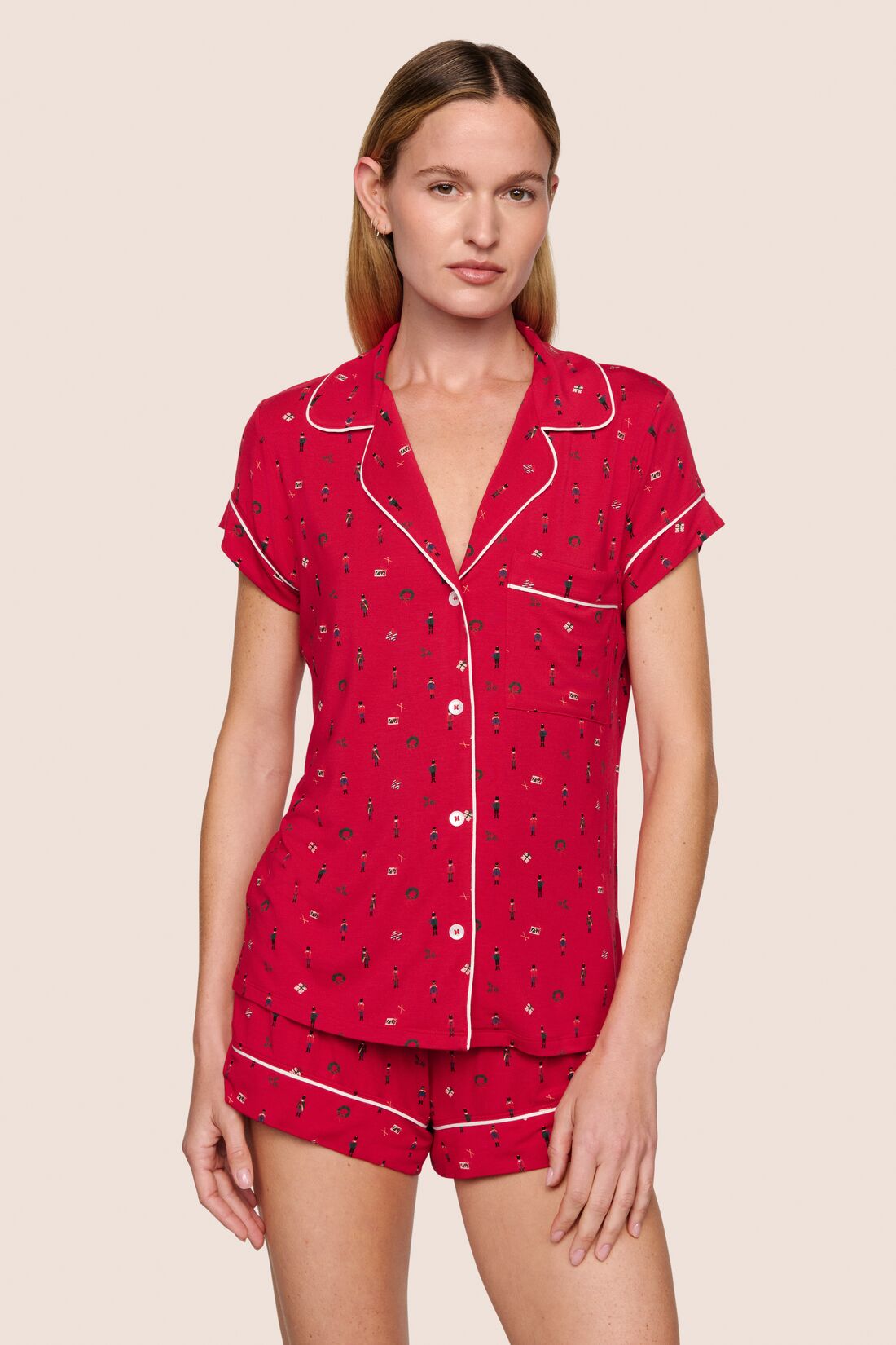 Model is wearing Gisele Printed TENCEL™ Modal Shortie Short PJ Set  in Nutcracker Holly Red/Ivory
