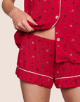 Model is wearing Gisele Printed TENCEL™ Modal Shortie Short PJ Set  in Nutcracker Holly Red/Ivory