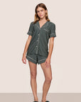 Model is wearing Gisele Printed TENCEL™ Modal Relaxed Short PJ Set  in Duo Stripe Pine/Ivory
