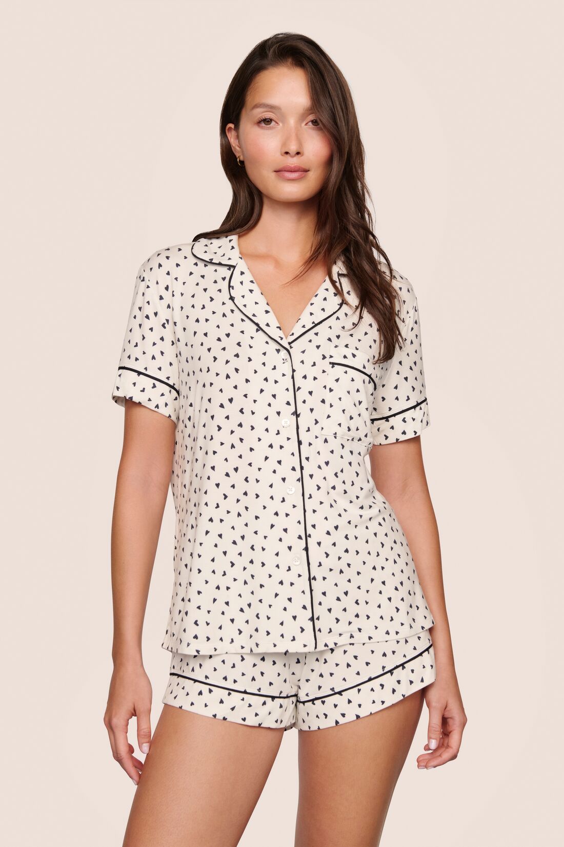 Model is wearing Gisele Printed TENCEL™ Modal Relaxed Short PJ Set  in Heart To Heart Black/Blk