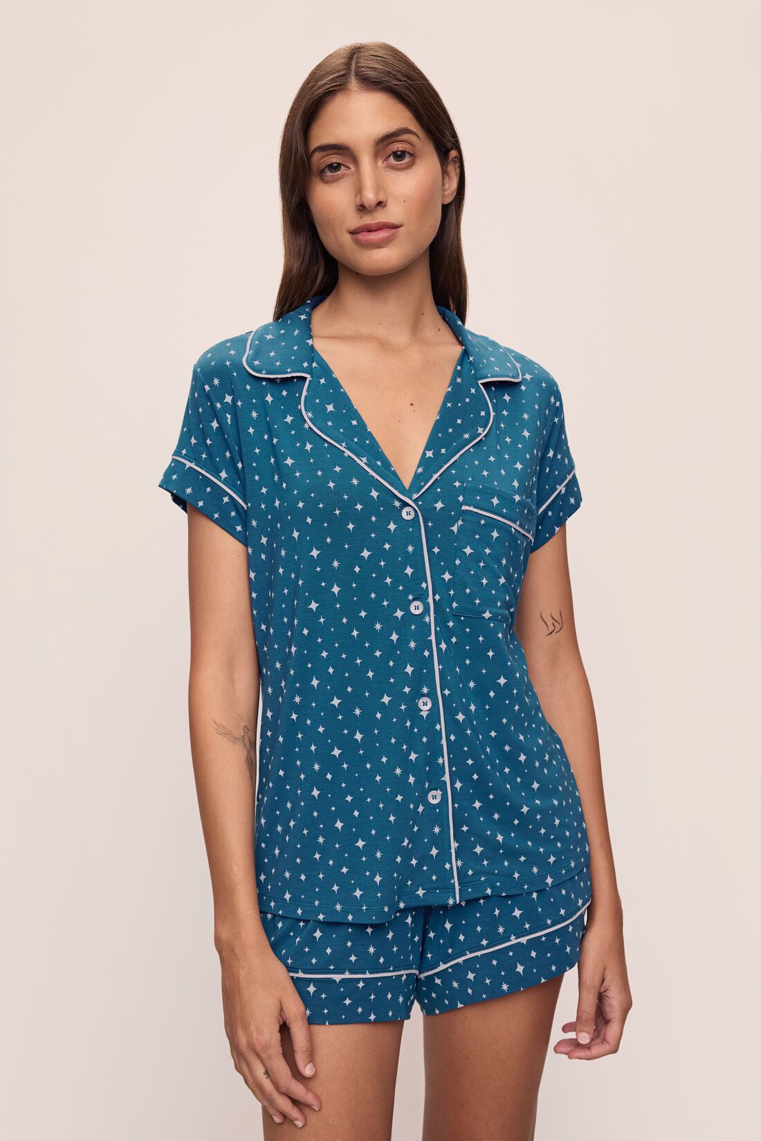 Model wears the Gisele Printed TENCEL™ Modal Relaxed Short PJ Set in Festive Lights Sapphire/Ivory.