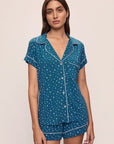 Model wears the Gisele Printed TENCEL™ Modal Relaxed Short PJ Set in Festive Lights Sapphire/Ivory.