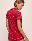 Model wears the Gisele Printed TENCEL™ Modal Shortie Short PJ Set in Winter Wonderland Haute Red/Ivory.