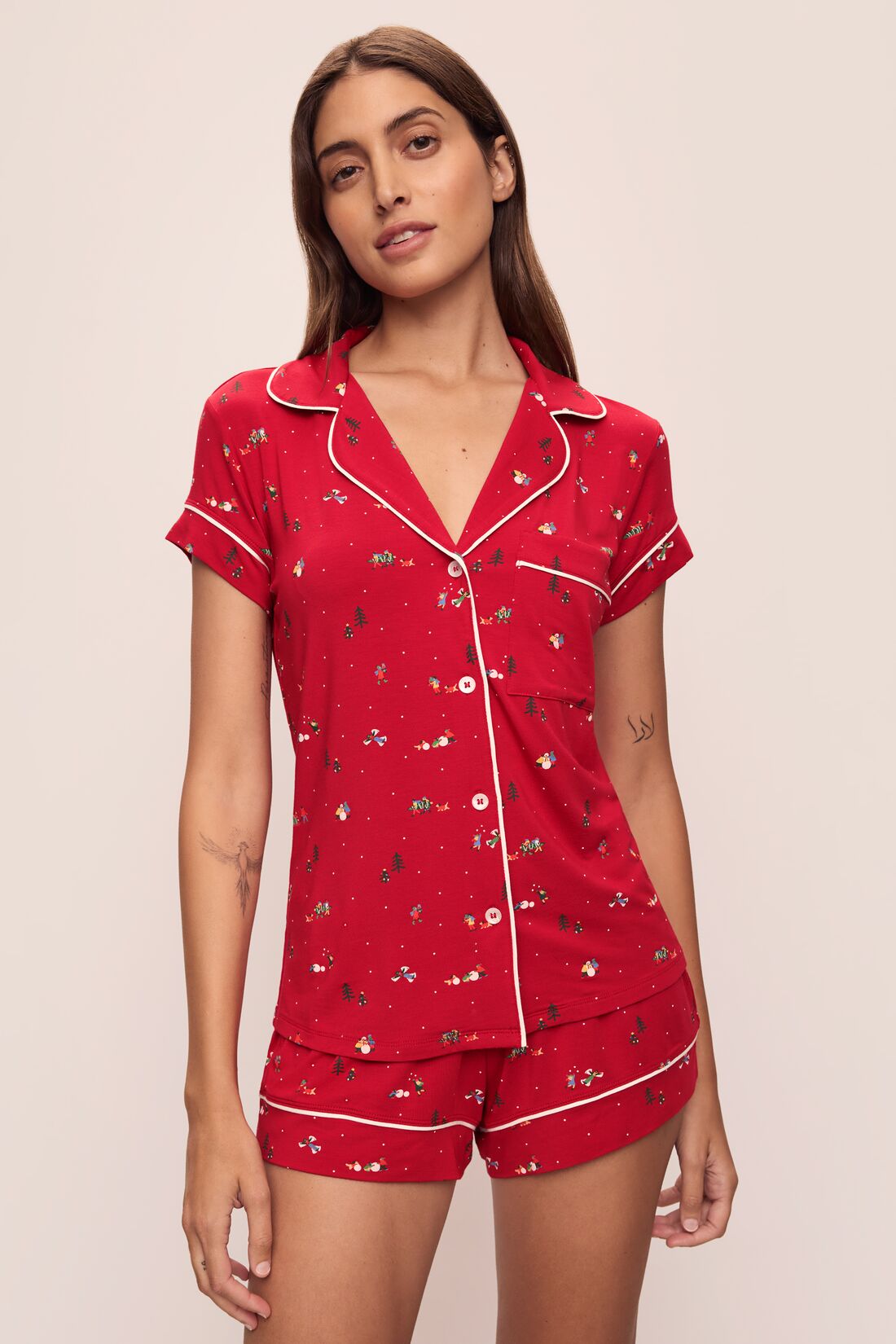 Model wears the Gisele Printed TENCEL™ Modal Shortie Short PJ Set in Winter Wonderland Haute Red/Ivory.