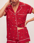 Model wears the Gisele Printed TENCEL™ Modal Shortie Short PJ Set in Winter Wonderland Haute Red/Ivory.