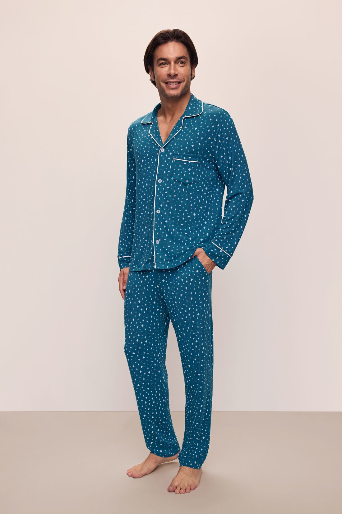 Model wears William Printed TENCEL™ Modal Long PJ Set in Festive Lights Sapphire/Ivory.