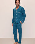 Model wears William Printed TENCEL™ Modal Long PJ Set in Festive Lights Sapphire/Ivory.