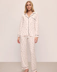 Model is wearing Gisele Printed TENCEL™ Modal Long PJ Set in Little Heart Sorbet Pink/Black 