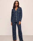 Model wears the Gisele Printed TENCEL™ Modal Long PJ Set in Woodland Pine Navy/Ivory.