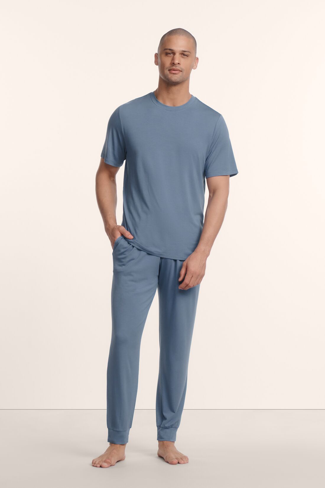 Model is wearing Henry TENCEL™ Modal Short Sleeve & Pant PJ Set in Slate Blue