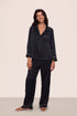 Model is wearing Inez Washable Silk Long PJ Set in Black/Champagne