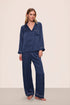 Model is wearing Inez Washable Silk Long PJ Set in Navy/Champagne