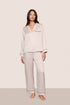 Model wearing Inez Washable Silk Long PJ Set in Heart to Silver Pink/Black