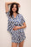 Model wears Inez Washable Silk Printed Short PJ Set in Mosaic Tile Denim Blue/Powder Blue.