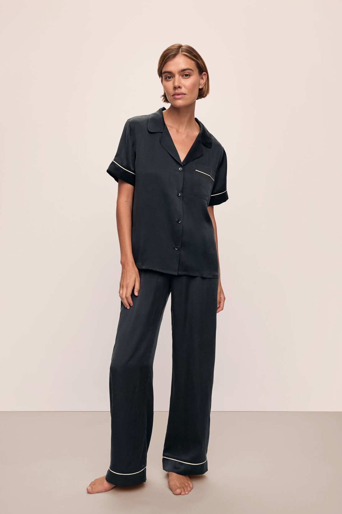 Model wears Inez Washable Silk Short Sleeve Pant PJ Set in Black/Champagne.