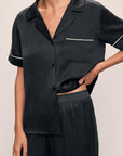 Model wears Inez Washable Silk Short Sleeve Pant PJ Set in Black/Champagne.