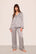 Model is wearing Inez Printed Washable Silk Long PJ In Tile Square Gray Dawn/Navy