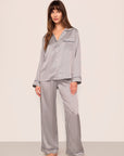 Model is wearing Inez Printed Washable Silk Long PJ In Tile Square Gray Dawn/Navy