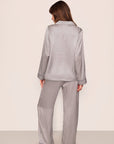 Model is wearing Inez Printed Washable Silk Long PJ In Tile Square Gray Dawn/Navy